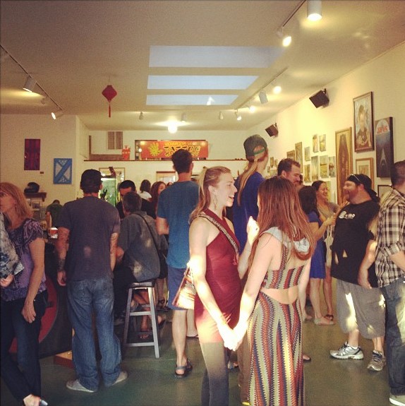 A very full gallery art opening at Buddha's Palm!